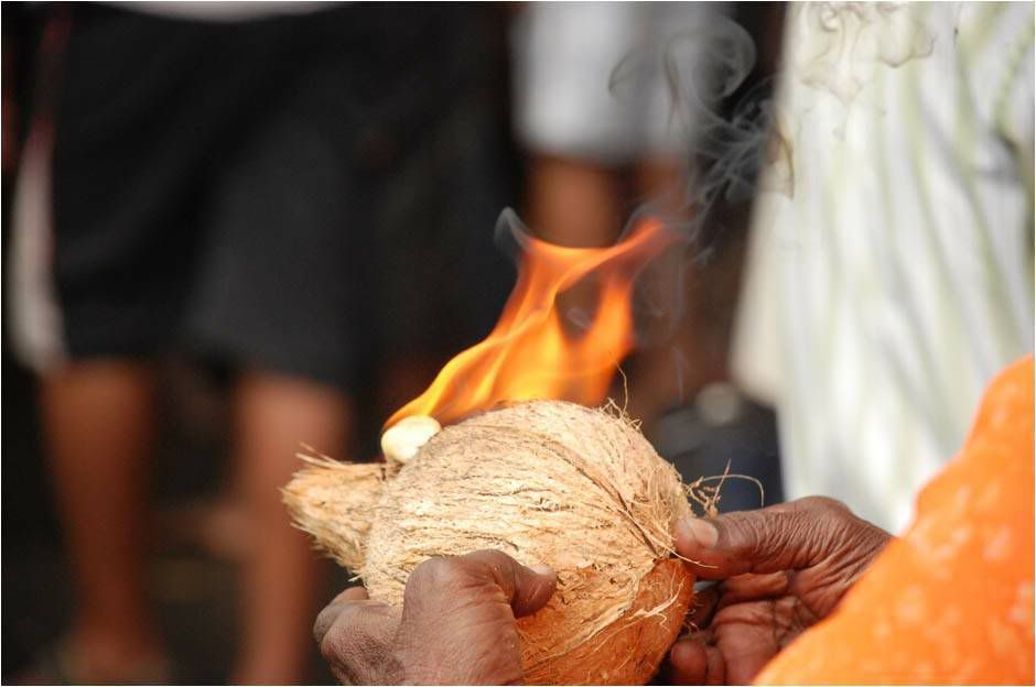 pooja coconut and burning camphor