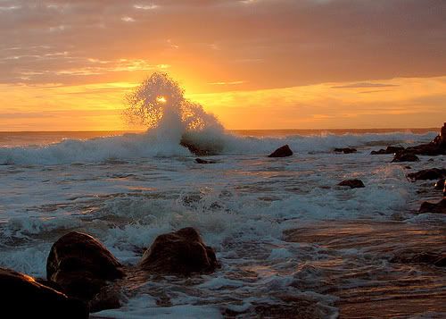 Ocean splash - beach sunset