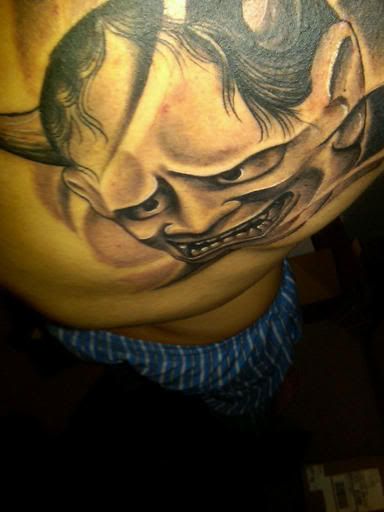 my first tattoo. hanya mask done by ray lee who works at rubes tattoo in