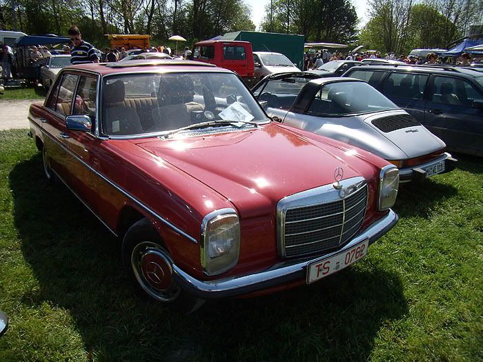 Here's a non US spec W115 with regular chrome bumpers and all of the other
